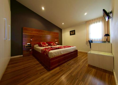Llit o llits en una habitació de Hotel Mas Prades