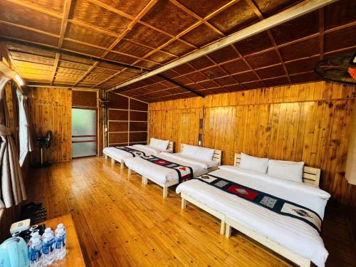 Postel nebo postele na pokoji v ubytování H'Mong Cát Cát Homestay