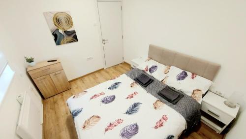 Ένα ή περισσότερα κρεβάτια σε δωμάτιο στο Apartment ENJOY BG