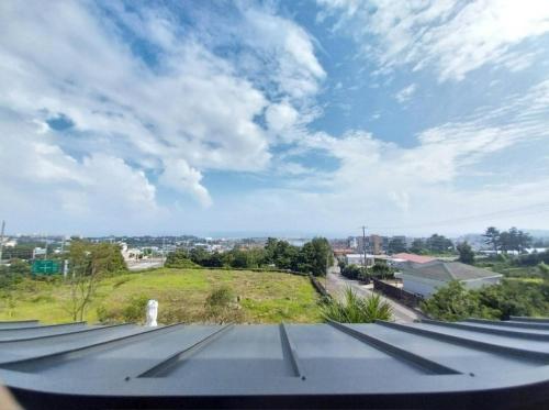 a view from the roof of a building at Seogwipo Wimiga Yeon in Seogwipo