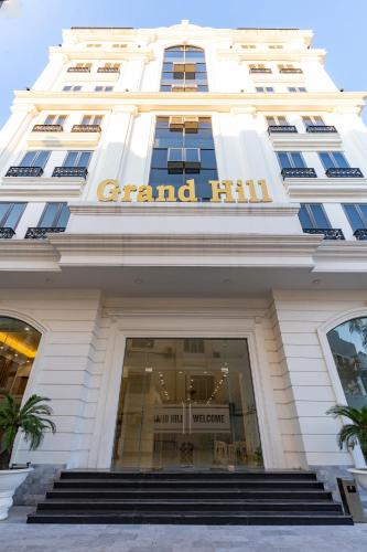 a front view of a grand hotel at Grand Hill Hotel & Apartment in Hai Phong