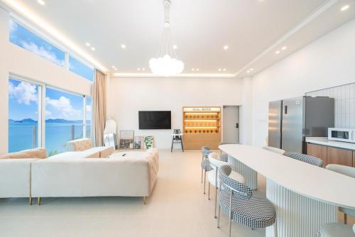 TV a/nebo společenská místnost v ubytování Yeosu Moine Pool Villa