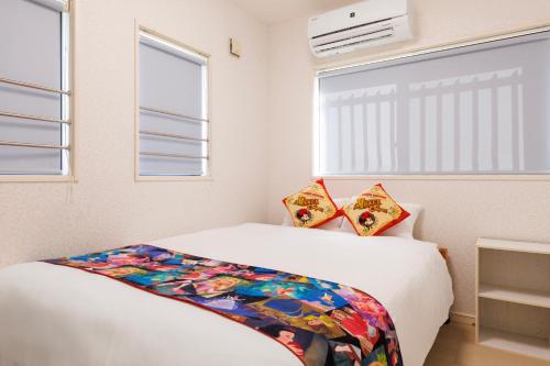 Postel nebo postele na pokoji v ubytování 一棟貸し完全プライベートビーチ6分 KOEI Farm lodge