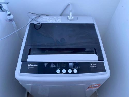 a toaster oven sitting on top of a wall at Mutiara Melaka Beach Resort by Glex in Tangga Batu