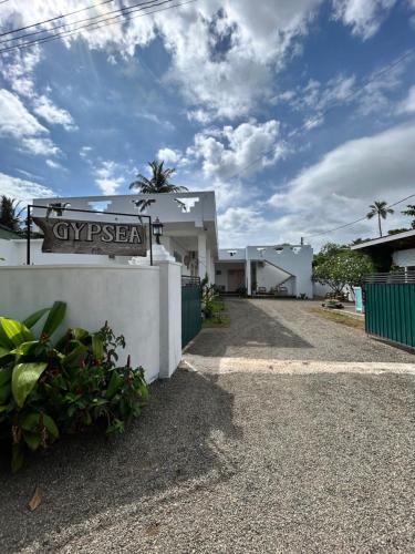 a building with a sign that reads gypsy agent at Gypsea' Madiha in Matara