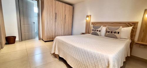 Postel nebo postele na pokoji v ubytování Residence Capri - Mont Choisy