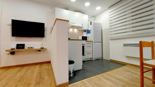 Η κουζίνα ή μικρή κουζίνα στο Apartment ENJOY BG