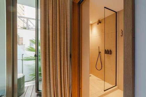 Salle de bains dans l'établissement Hôtel de La Plage