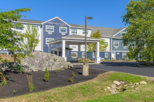 a large blue building with a building at SpringHill Suites by Marriott Freeport Brunswick in Freeport