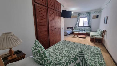 Postel nebo postele na pokoji v ubytování Hotel Zelis