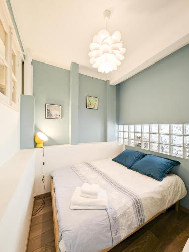 Ένα ή περισσότερα κρεβάτια σε δωμάτιο στο Lilit beautiful 1 bedroom apartment on the border with Monaco