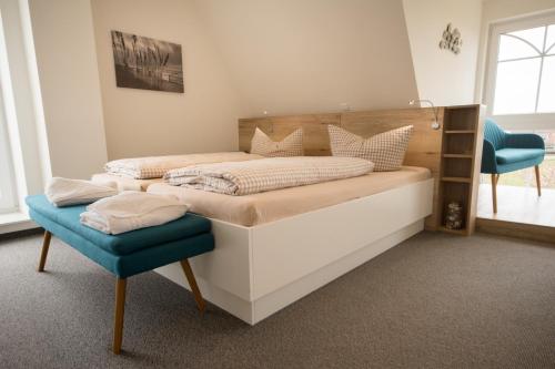 Postel nebo postele na pokoji v ubytování Hotel Nige Hus
