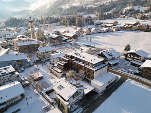 an aerial view of a town in the snow at Mari Pop Hotel in Ried im Zillertal