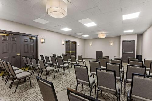 a room with rows of chairs in it at Wingate by Wyndham South Bend - Notre Dame in South Bend