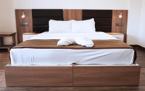 Postel nebo postele na pokoji v ubytování Misty Garden Resort and SPA