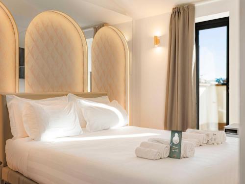 Postel nebo postele na pokoji v ubytování B&B Hotel Firenze Laurus Al Duomo