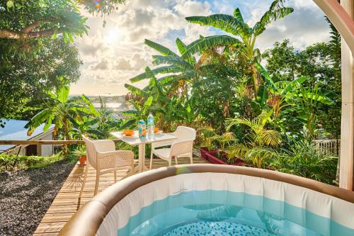 Suite avec spa vue et jardin