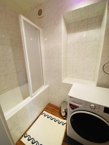 a small kitchen with a stove and a window at Appartement Cseho in Murau