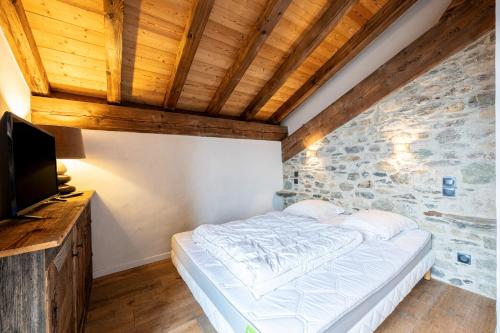 Postel nebo postele na pokoji v ubytování Chalet Bordon