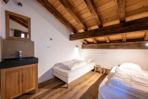 Postel nebo postele na pokoji v ubytování Chalet Bordon