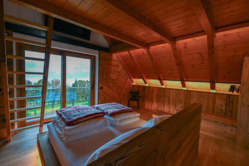 Cinque Sensi Wellness Apartmentsにあるベッド