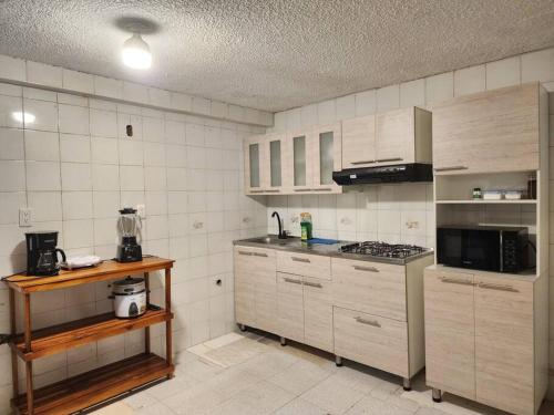 مطبخ أو مطبخ صغير في Casa turística contemporánea