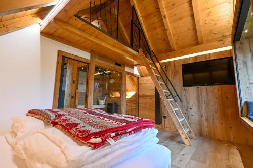 Cinque Sensi Wellness Apartmentsにあるベッド