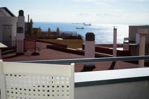 a view of the ocean from a balcony at Tgna Lluria 11 in Tarragona