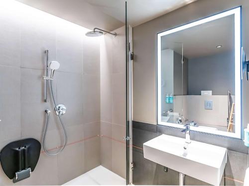 Ванная комната в Novotel Setubal