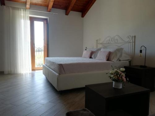 Postel nebo postele na pokoji v ubytování Appartamento Il Riccio home & relax