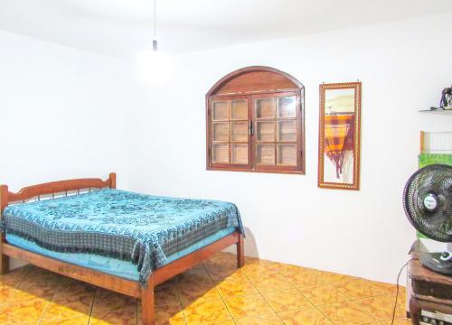 Postel nebo postele na pokoji v ubytování Linda casa a 170m da Praia do Pero em Cabo Frio RJ