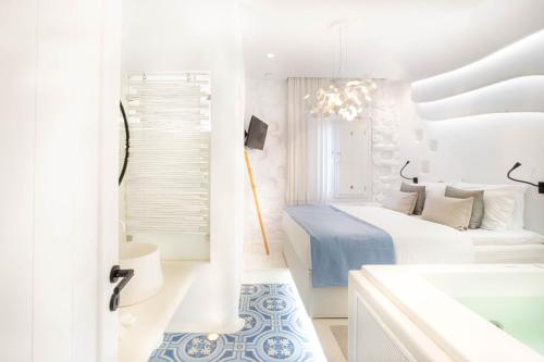 A bathroom at AMMOS at AmazeU Suites Naxos
