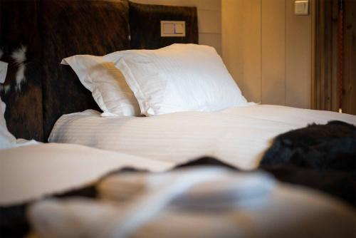 Photo de la galerie de l'établissement Madame Vacances Chalet Brioche, à Les Allues