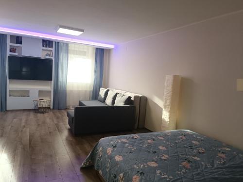 Posteľ alebo postele v izbe v ubytovaní Tp Apartman
