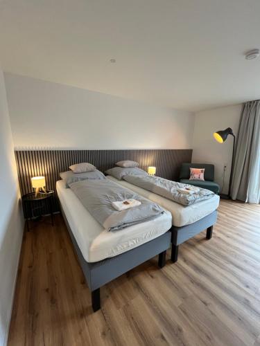 Una cama o camas en una habitación de Bodensee Stadtapartment