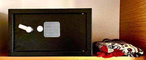 a remote control sitting on top of a table at Résidence America in Dakhla