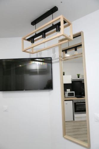 Kuchyň nebo kuchyňský kout v ubytování Joli studio Clim & Wifi
