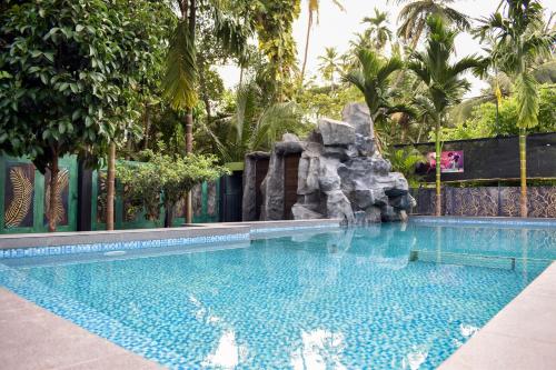 Bazén v ubytování Farm Fort Resort nebo v jeho okolí