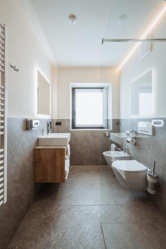 Koupelna v ubytování Residence Piz Aot