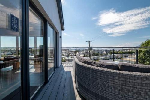 a balcony of a building with a view of a city at BayView Luxury 4 Bedroom Villa in Downings