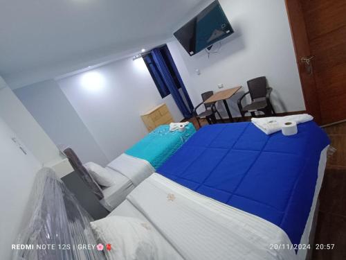 Hotel Grand Paradise Marconaにあるベッド