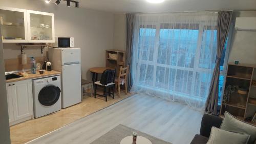 Kuchyň nebo kuchyňský kout v ubytování Sky Hills Apartment