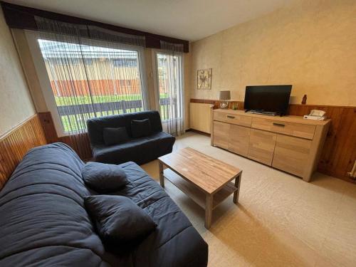 Appartement 2 pièces aux pieds des pistes avec parking, casier à skis et cuisine équipée - FR-1-593-48