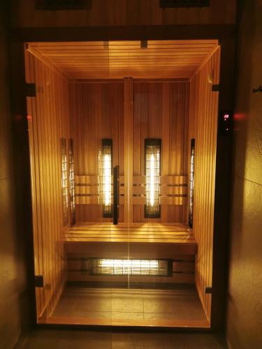a reflection of a room with three lights in it at Willa Trawers in Zakopane