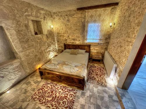 Postel nebo postele na pokoji v ubytování Panda Stone House