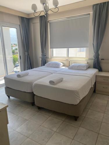 Gallery image of The Prince Inn Hotel & Villas in Kérynia