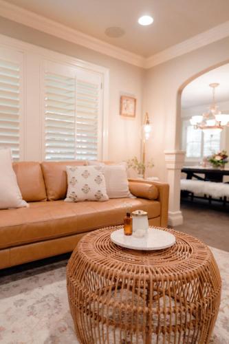 a living room with a couch and a table at Luxury House, Walk to Downtown or Pioneer Park in Nevada City