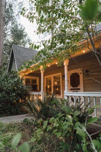 a house with a porch with lights on it at Luxury House, Walk to Downtown or Pioneer Park in Nevada City