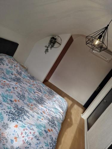 Postel nebo postele na pokoji v ubytování appartement en pleine nature