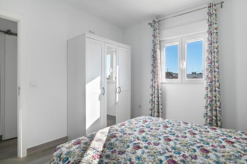 Postel nebo postele na pokoji v ubytování Villa de Gomar